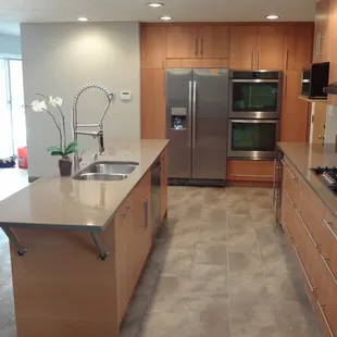 a modern kitchen with stainless steel appliances