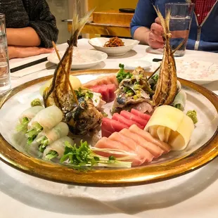 Aji with assorted sashimi and rolls