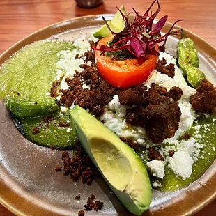 Huevos Rancheros are impressive. The green sauce was packed with flavor and love the shishito peppers and tomato.