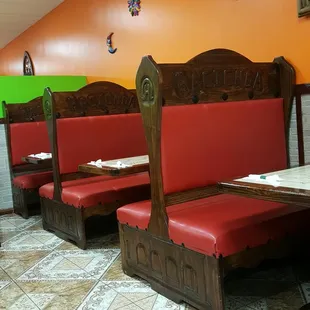 a row of booths in a mexican restaurant