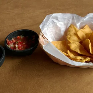 Free chips and salsa. The smooth red sauce is really good i asked for seconds to put on the beans and rice.