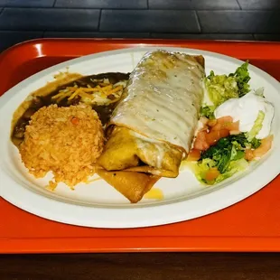 Chimichanga fried burrito with Side of rice and beans