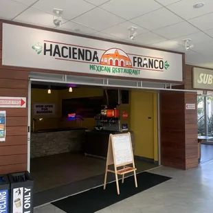 the entrance to a restaurant