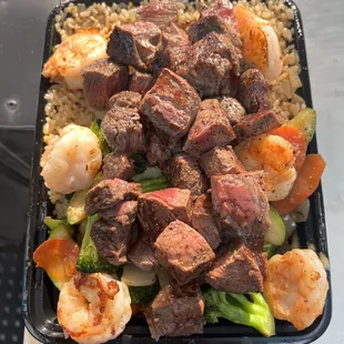 Fillet Mignon &amp; Shrimp combo plate. Served with extra steak ( extra cost)
