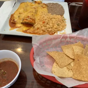 Chicken enchiladas in red sauce
