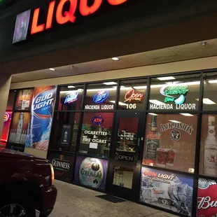a liquor store at night