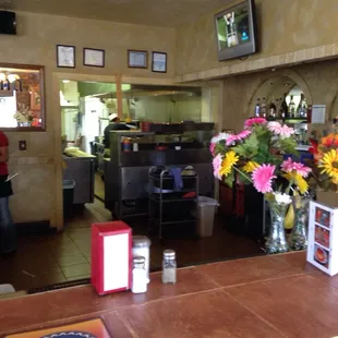 a view of a restaurant counter