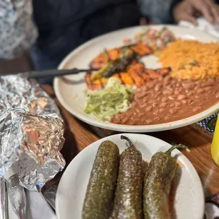a table full of mexican food