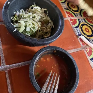 Cabbage and salsa with chips.