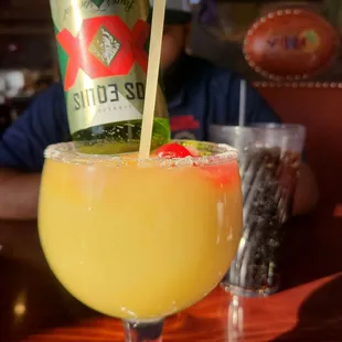 a drink in a glass with a straw
