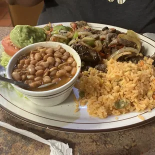 Fajita plate with charro beans and Mexican rice