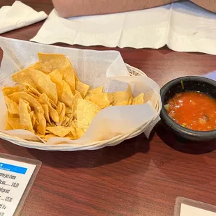 Great chips, bland and watery salsa