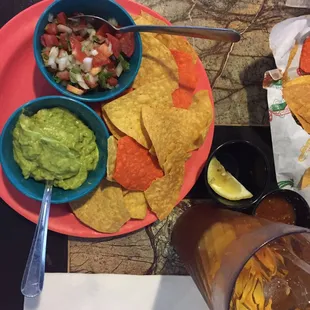 MY dinner. Pico de gallo with guacamole and  corn chips. Keeping my meal &quot;raw&quot; in restaurants is not always easy. Bill was $5.95.