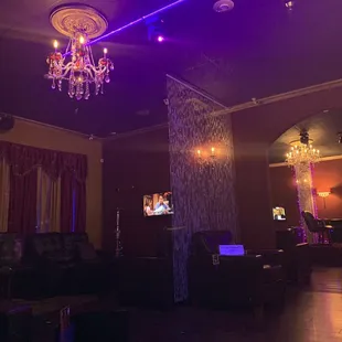 a chandelier and couches