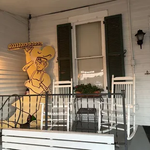 Who wouldn&apos;t want to enjoy a donut on this little porch?