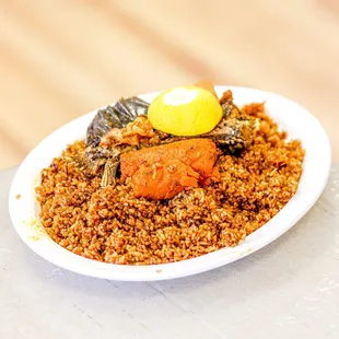 Jollof rice with fish  IG: michellelieats