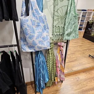 Reusable tote bags and pareos (wraps/scarves)