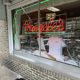 a neon sign in the window