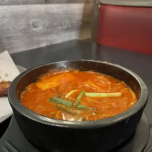 #4, Kimchi Jjigae, Kimchi stew with pork.tofu.slice rice cake