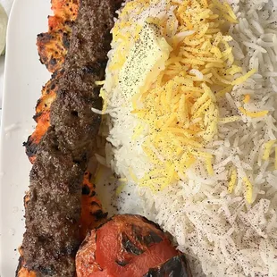 a plate of meat and rice
