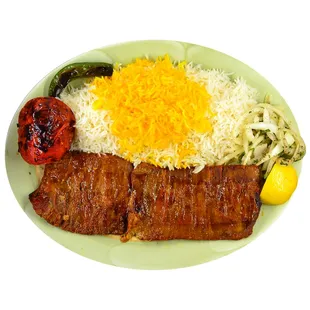Barg Kabob: A thin layer of filet mignon marinated in a secret sauce and charbroiled over open, served with basmati rice.