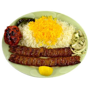 Beef Koobideh $14.00 Two skewers of juicy ground beef skewered daily and cooked over open fire, served with basmati rice.