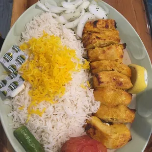 Chicken kabob over a bed of basmati rice