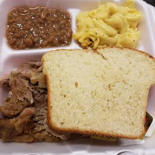 Pull Pork sandwich with homemade Bread, Mac and Cheese and Baked Beans. SO GOOD.
