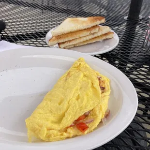 What? This is the $15 omelette?  Eggs with onions peppers and cheese.  $23 with coffee and tip. Yikes.