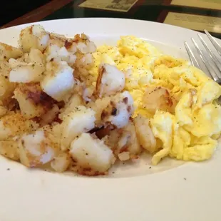 Two eggs with potatoes and toast for 5.50.