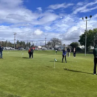 Golfing lessons on the putting green
