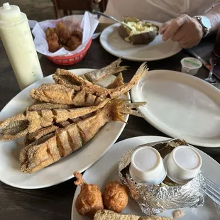 4 whole fish for two with baked potatoes and hush puppies. Excellent as always, you can&apos;t do wrong eating here