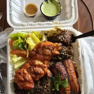 oxtail, grilled chicken, beans, coconut cilantro rice, citrus side salad and plantain