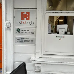 a sign in front of a store