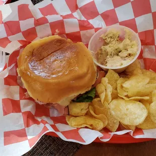 Taven Ham on a Keiser Roll, Potato salad, and chips.