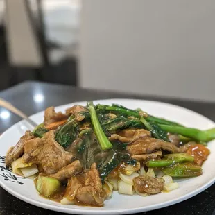 Stir fried flat rice noodle with beef and Chinese broccoli