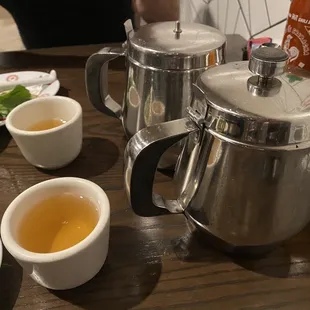Tea for two people, two full sized pots . You might need to clarify one pot of tea, two cups.