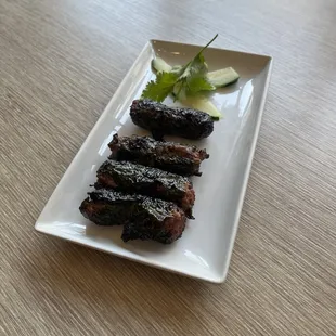 Bo La Lot - Hawaiian Leaf wrapped sausages