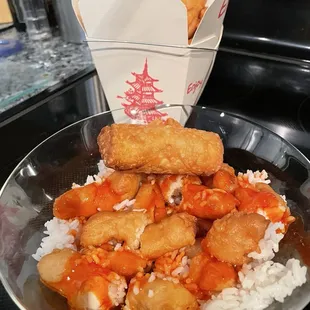 Sweet and sour chicken and an egg roll