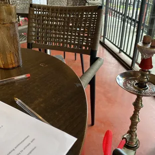 a table with a glass of wine