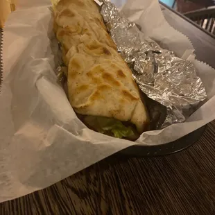 a burrito wrapped in foil
