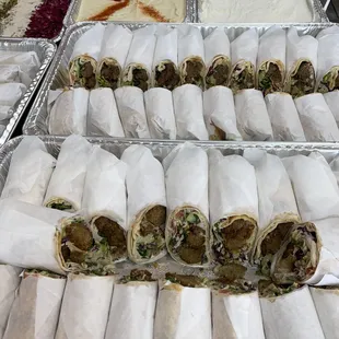 several trays of food