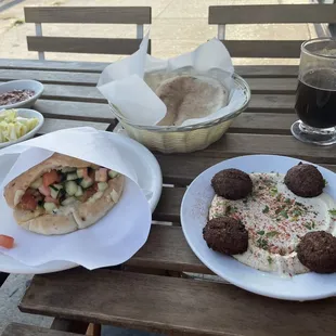 Shish kebab chicken pita with hummus and falafel starter and hot pita bread.  Turkish coffee.
