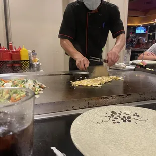 This is the cook making the eggs.