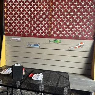 Cute anthropomorphic fish on the patio