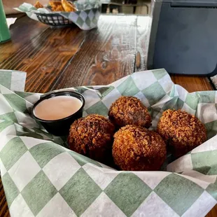 Helm's sauerkraut balls HOLY TOLEDO I was not expecting the Brat in there nor the horsey sauce. Wow. Made the dish. GREAT