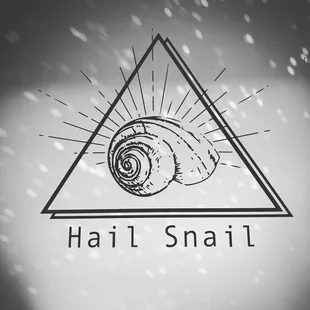 a black and white photo of a snail