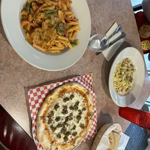 Chicken Alfredo, meatball pizza, and shrimp alla chipotle