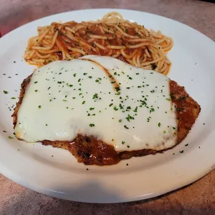 Chicken parmesan with pasta side. Delish