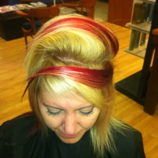 blonde with peek a boo red highlights